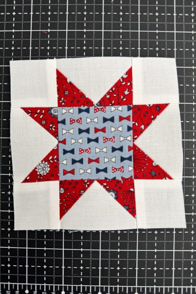 Assembled sawtooth star quilt block
