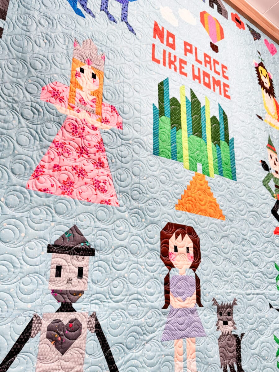 Angled up close view of a portion of the Sew Place Like Home quilt.