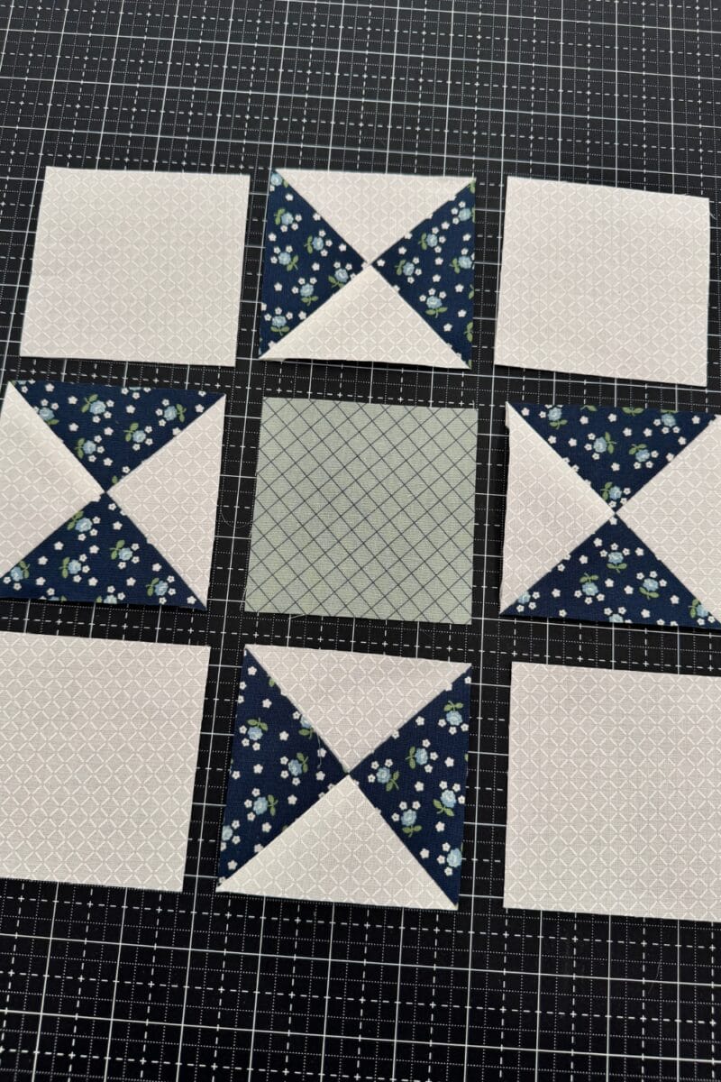 The individual units of the Ohio Star block laid out but not sewn.  