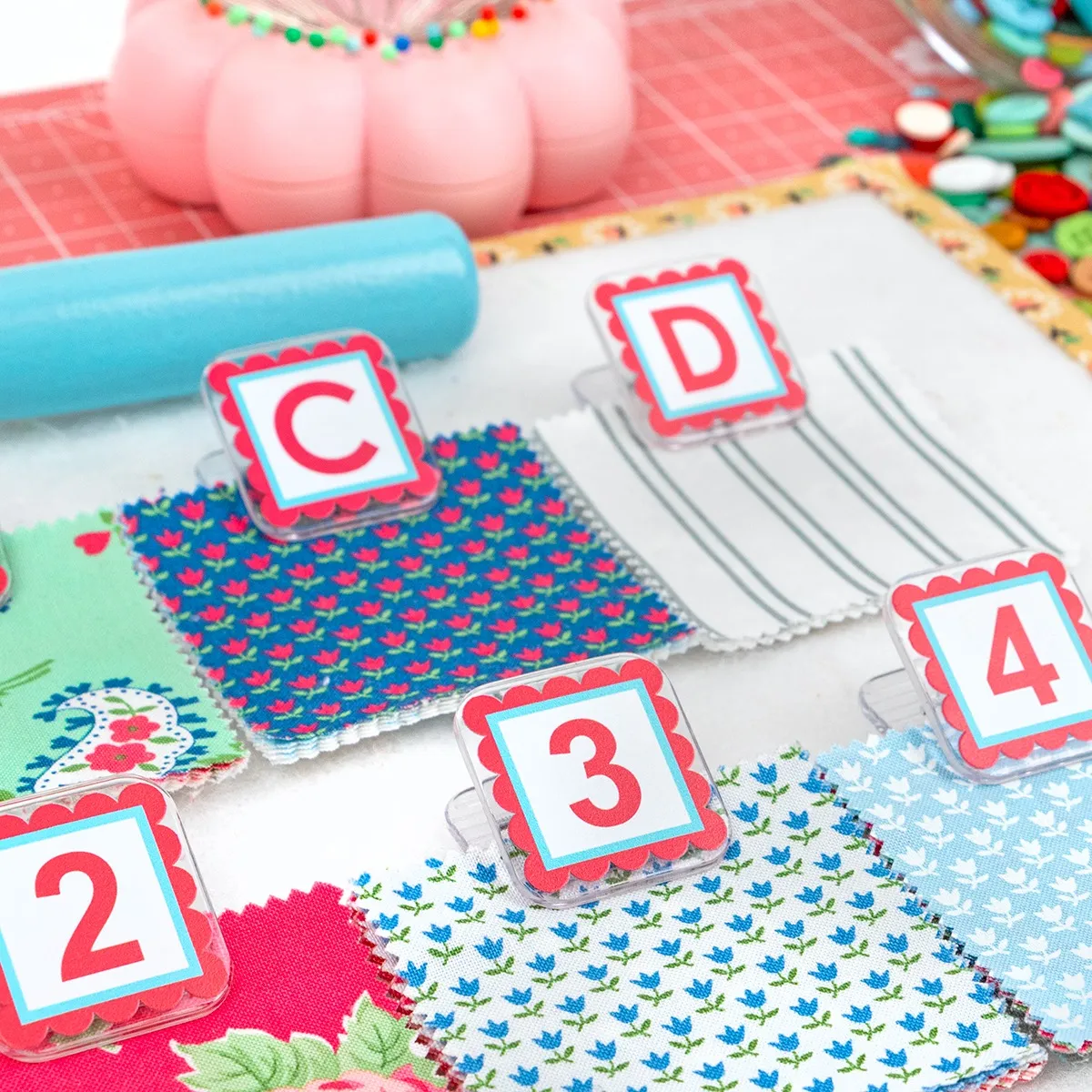 Alpha clippies in pink.  Clips with letters and numbers on them to clearly mark fabric pieces